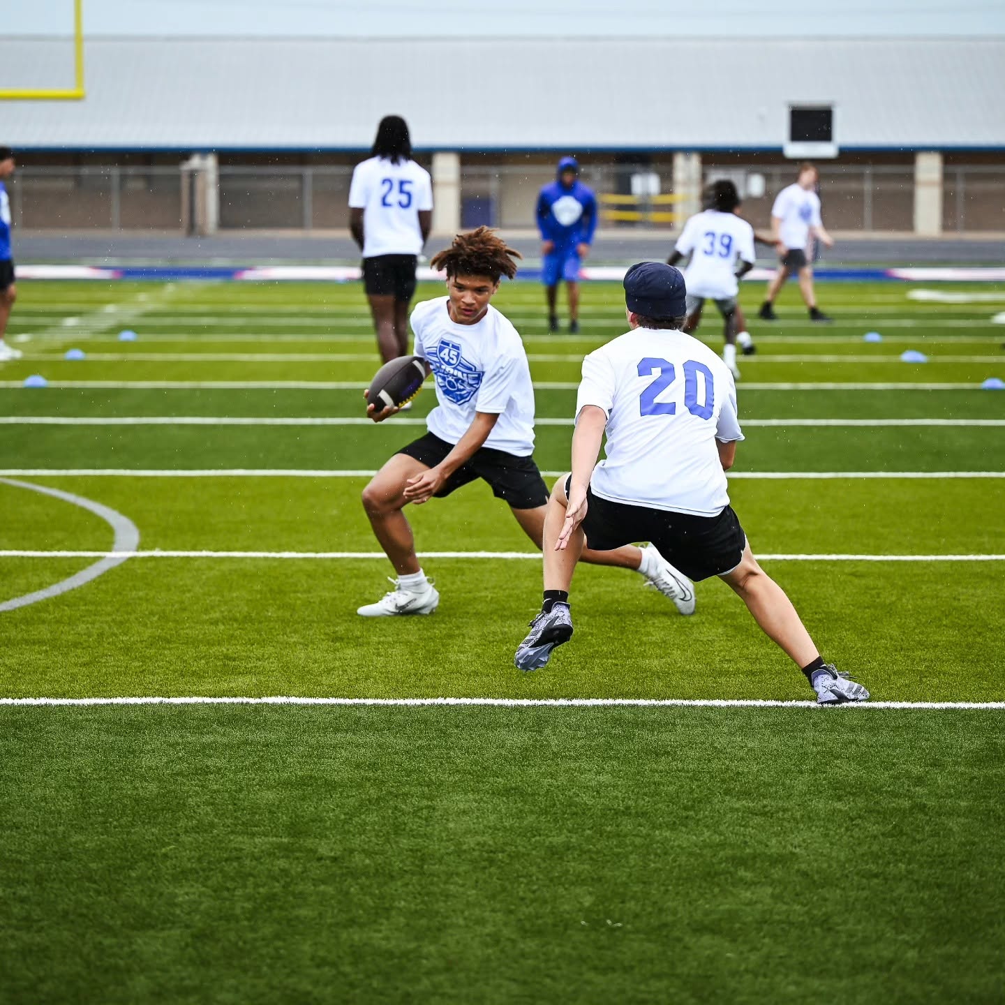 Taylor Sports Performance athletes working through position-specific football skill development drills during athlete development training in East Texas